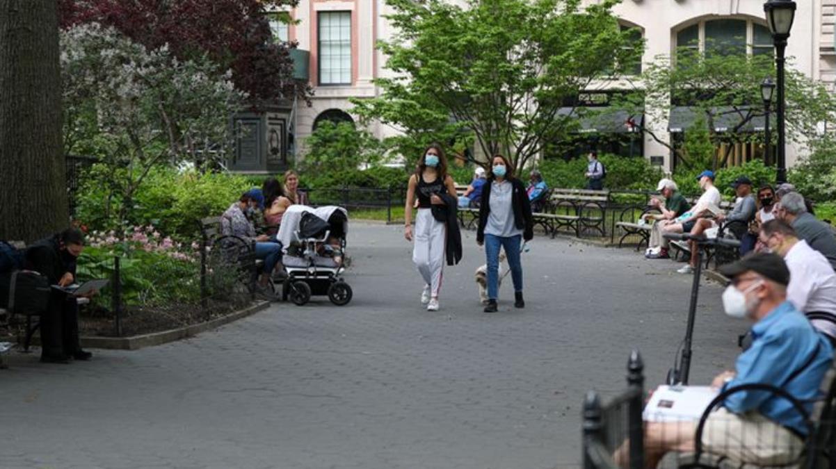 ABD’de aşılanmış kişiler maske takmayacak