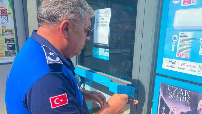 Serik Belediyesi zincir marketi mühürledi
